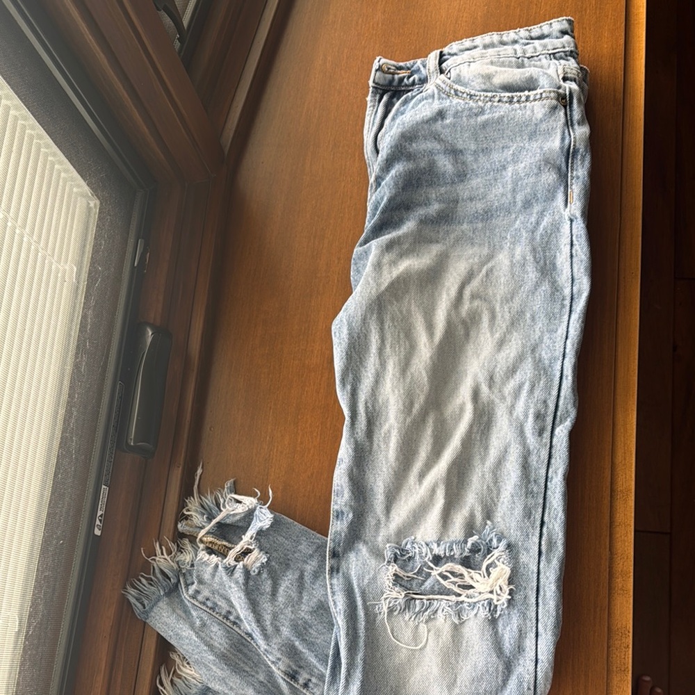 Distressed Light Blue Jeans